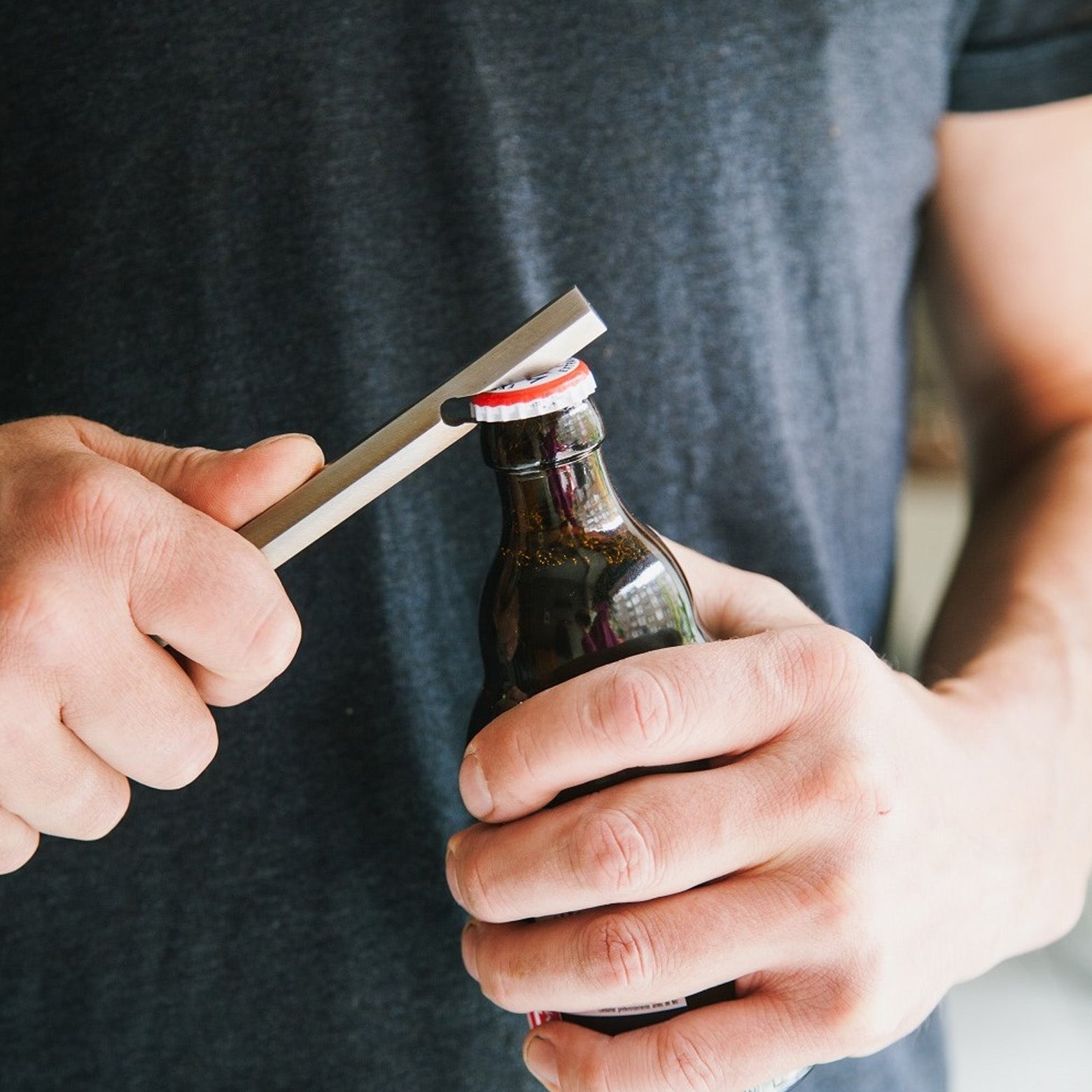 Bottle opener with leather case