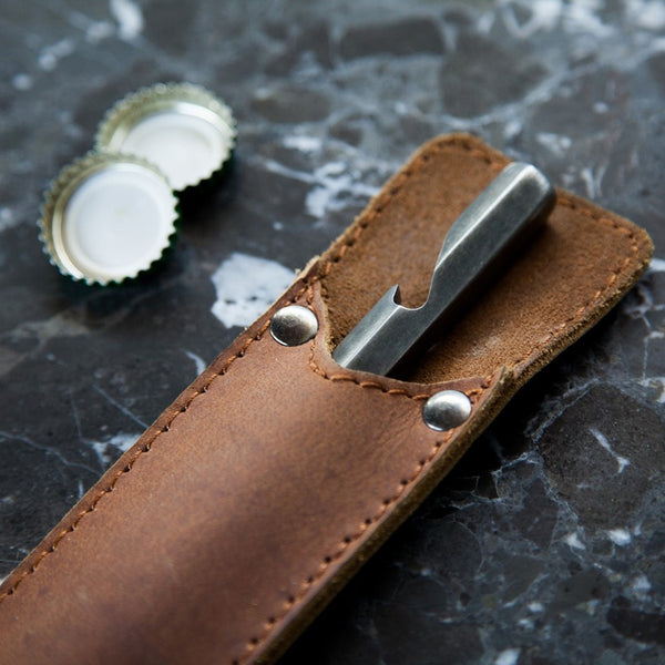 Bottle opener with leather case
