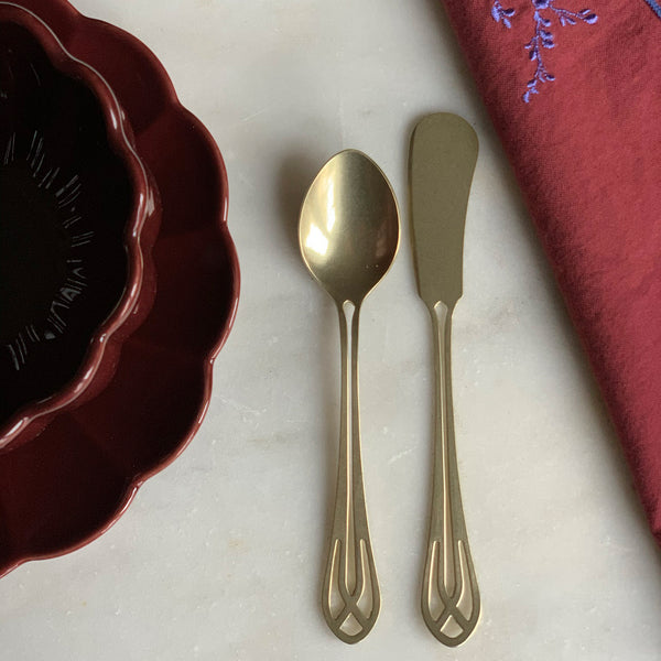 Cutlery set in champagne colour